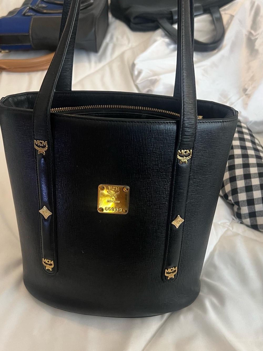 MCM Black Leather bucket bag  with Gold Logo Plate